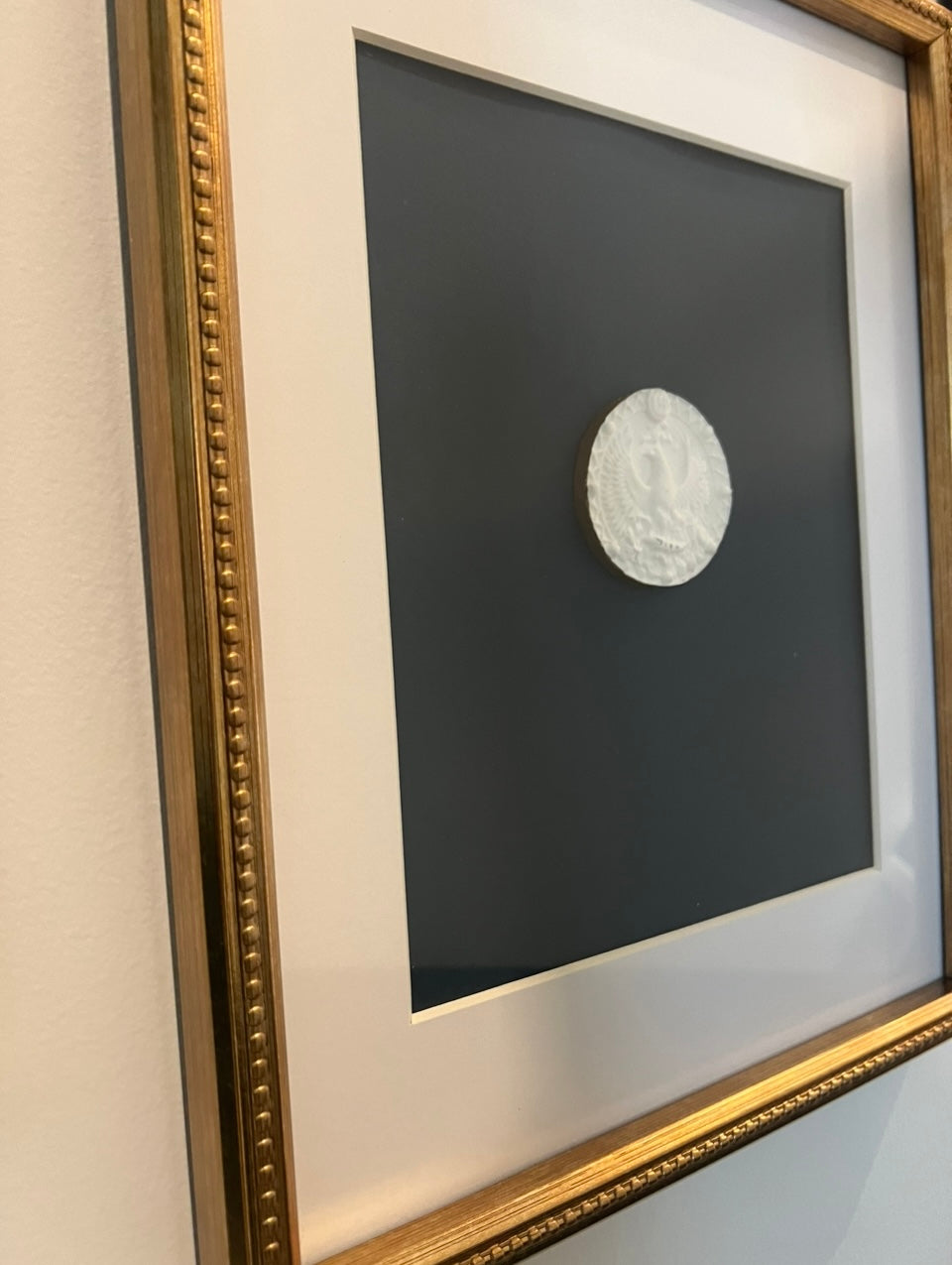 Framed intaglio - Scorpio zodiac sign on blue linen paper with brass frame